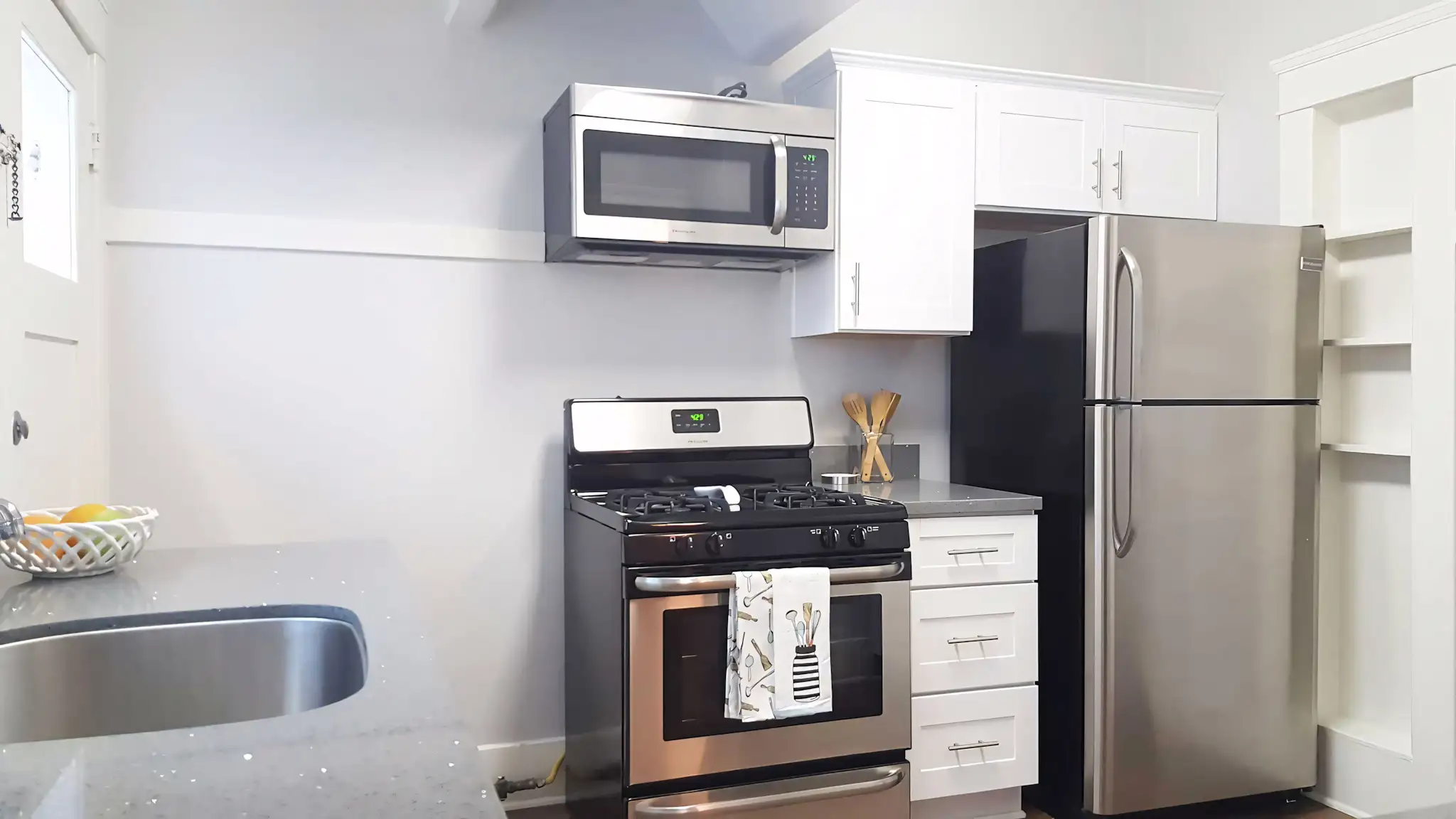 SeaGlass updated kitchen with white appliances and ample storage