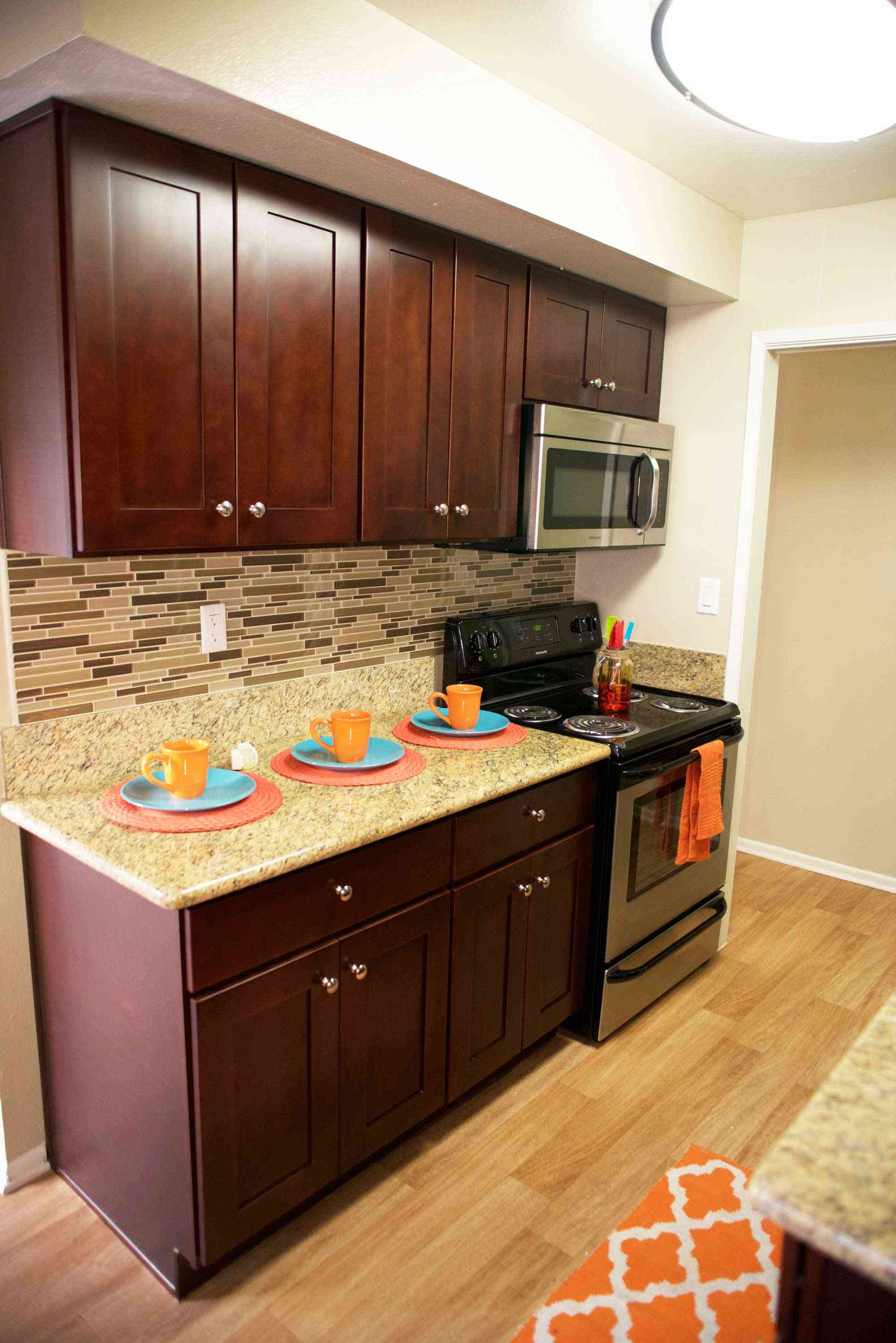 lime on 4th apartments updated kitchen with stainless steel microwave and stove