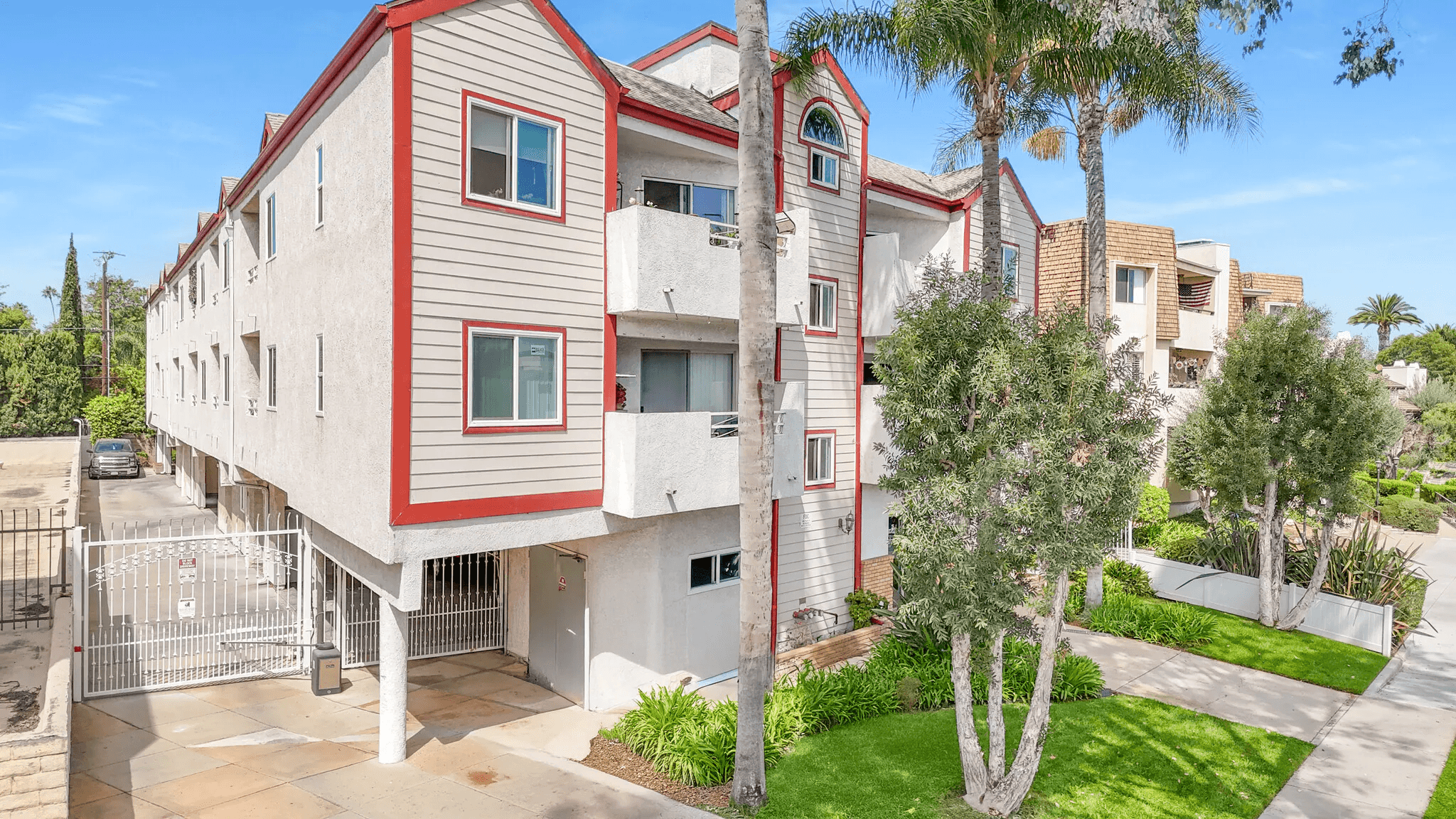 villa virginia apartment gated parking and front view of complex