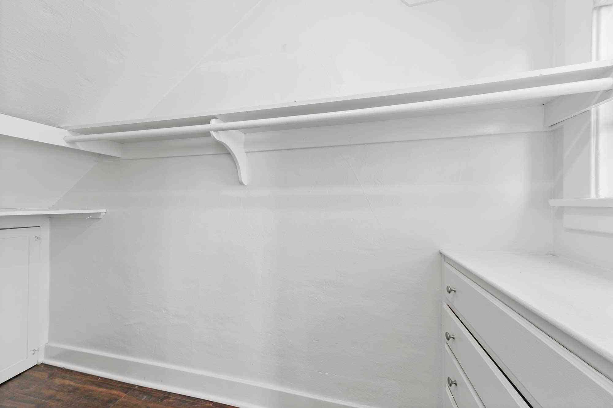 knolls on elm apartments walk in closet with built in drawers and shelving